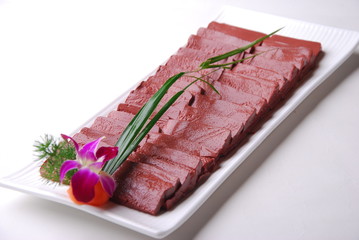 raw meat on a cutting board