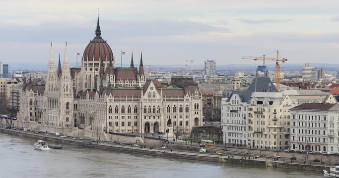 BUDAPEST, HUNGARY - JANUARY 17, 2019 : Gothic architecture of famous Hungarian Parliament building exterior view at winter time