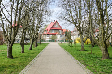 CITYSCAPE - Spring park alley and tenements of city residents