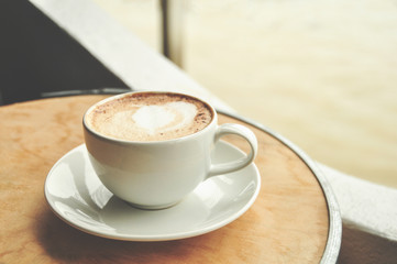 coffee cup on the wooden table