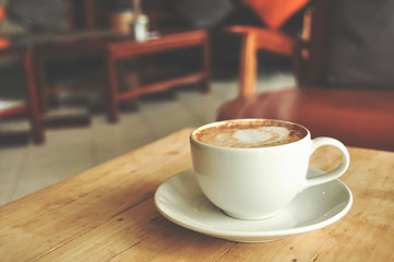 coffee cup on the wooden table