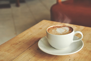 coffee cup on the wooden table
