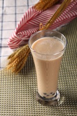 glass of milk on blue background