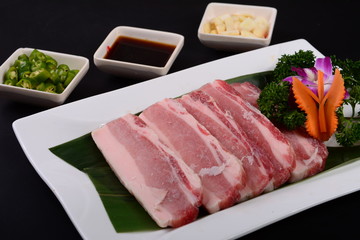 raw meat on a cutting board