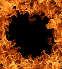 A fire frame of burning flame on dark background for abstract graphic design purpose  © Akarawut