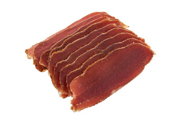 Basturma, dried tenderloin of beef meat, thinly sliced, on a white background.