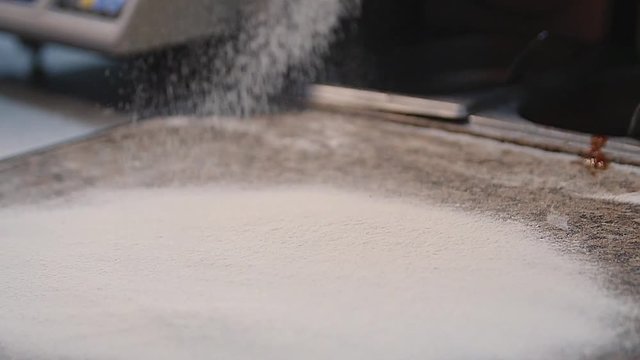 Macking pizza in slow motion