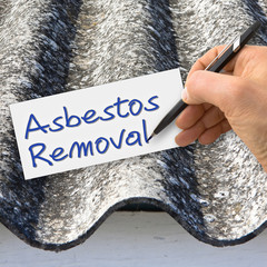 Hand writing Asbestos Removal with a pencil on a white sheet - concept image