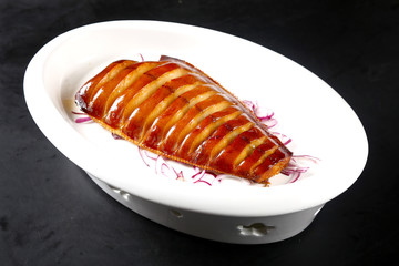 grilled salmon steak on plate