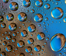 Colored Water Drops on a smooth glass surface