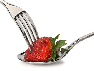 Strawberry, fork and spoon from steel