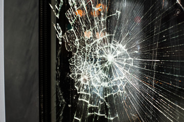 Broken glass background on city lights background