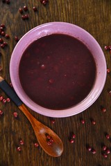 cup of coffee with heart on red background