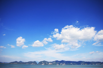 Fototapeta na wymiar white clouds under blue sky on summer.