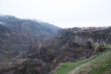 Fototapeta na wymiar village on the edge of gorge in the mountains