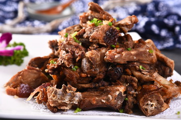 grilled pork ribs on white plate