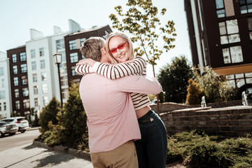 Beautiful happy couple standing together in the neighborhood