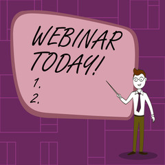Text sign showing Webinar Today. Business photo showcasing presentation workshop or seminar that is transmitted over Web Confident Man in Tie, Eyeglasses and Stick Pointing to Blank Colorful Board