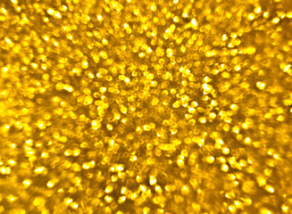 Textured golden background with brilliance
