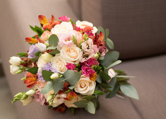 Fototapeta na wymiar bride bouquet with orange roses