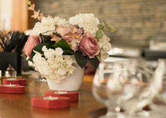 flower arrangement on wooden table