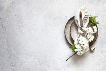 Table setting for happy Easter in rustic style.