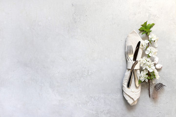 Table setting for happy Easter in rustic style.