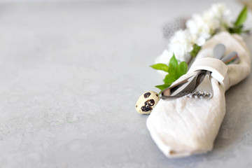 Table setting for happy Easter in rustic style.