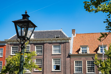 Fototapeta na wymiar houses in Leiden, The Netherlands, against blue sky