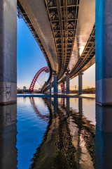 The Stroginsky Bridge in Moscow is an automobile-tram bridge across the Moscow River that connects the regions of Shchukino and Strogino to the North-West District of Moscow.