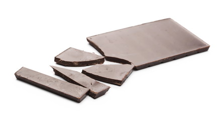Chocolate bar pieces isolated on white background 