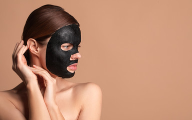Woman looking to the left while having mask on her face