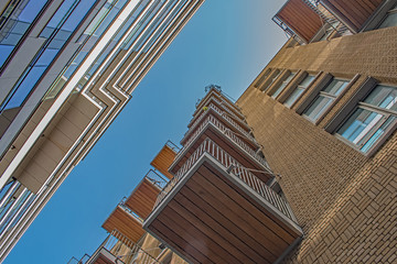 underneath London City apartment balconies above the trendy shopping streets