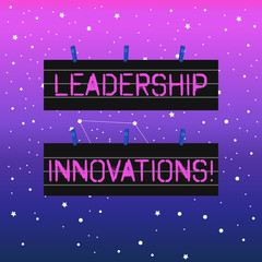 Handwriting text writing Leadership Innovations. Conceptual photo Style to impact employees to produce creative ideas Two Color Blank Strip Size Lined Paper Sheet Hanging Using Blue Clothespin