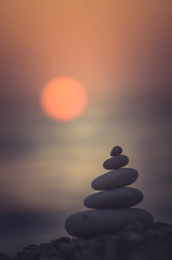 stack of zen stones on pebble beach