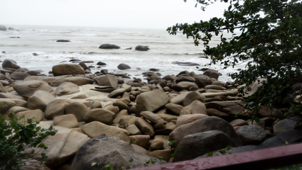 Beautiful seascape of rock and wave near Teluk Chempedak