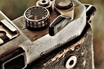 Close up of a vintage camera with lens. Analog camera that works with rolls. 