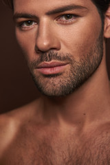 Obraz premium Close up portrait of handsome bristle young man
