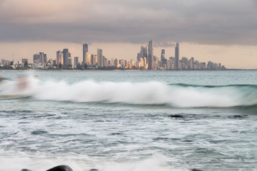 Surfers surfing at Gold Coast
