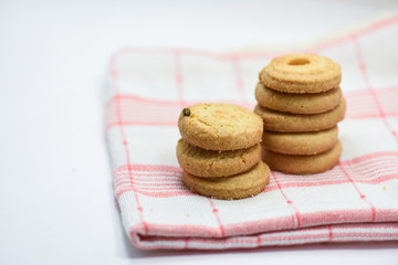 butter cookies pastry on table cloth on white background