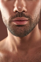 Obraz premium Low face portrait of young handsome bristle man