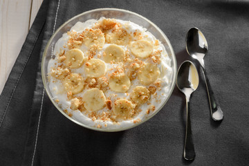 Bowl of cream and banana