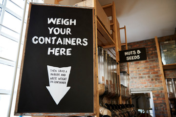 Weigh Your Container Sign In Sustainable Plastic Free Grocery Store