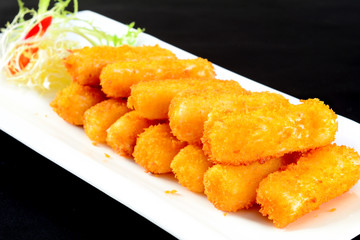 fried potatoes with sauce on plate