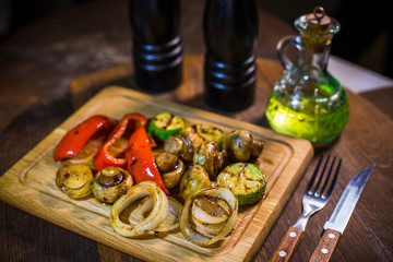 Grilled vegetables, zucchini, red pepper, champignons, onions