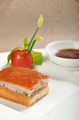 slice of cake with ice cream and strawberries