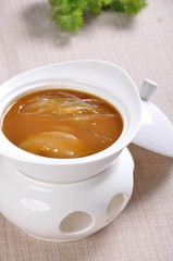 cup of tea with lemon on wooden table