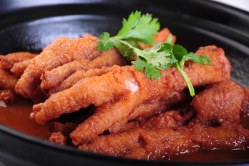 grilled chicken wings with spicy sauce and vegetables