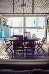 The view from the window in the winter, as well as the lake and forest