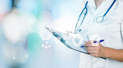 Close-up Doctor at hospital working with tablet pc